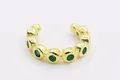 Polsino per orecchio in argento S925 placcato oro con pietre di zirconia verde incastonate - Oro Zirconia Verde