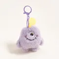 Detailopname van paarse pluche monster sleutelhanger met borduursels en accenten - Paars Klein Monster