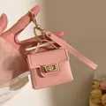 Rosa Mini-Leder-Geldbörse Schlüsselanhänger mit goldenem Drehverschluss und Band - Rosa