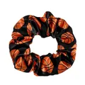 Detail of black satin scrunchie with orange basketball patterns and elastic texture - Black Basketball