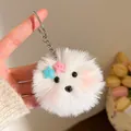Close-up van witte pluche hamster sleutelhanger met sterren en zilveren metalen ring - Witte Sterknop Roze Blush (Stijl 3)