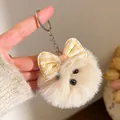 Detail van witte pluche honden sleutelhanger met gele geruite strik voor tas decoratie - Crème Geel Geruite Strik (Stijl 6)