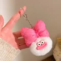 Close-up of plush keychain featuring a pink bow, big eyes, and funny pink sausage lips - Rose Red Bow with White Plush Ball