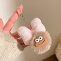 Close-up of plush keychain with funny thick lips and pink checkered bow decoration - Light Pink Bow with Brown Plush Ball