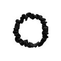 Detailed view of black satin fabric scrunchie with smooth texture and pleated elastic band - S / Black