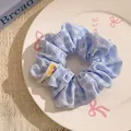 Premium light blue striped fabric scrunchie hair accessory for women ponytail styling - Blue Striped with Handmade Tag