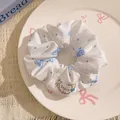 Blue polka dot and butterfly pattern scrunchie with puppy label in white ceramic tray - White with Blue Polka Dots and Butterflies