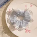 Light blue fabric scrunchie with elegant white lace trim for hair styling - Light Blue Pleated with White Lace Trim