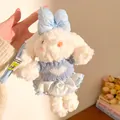 Detailed macro view of a plush bunny keychain featuring a blue bow and heart knit sweater - Blue Bow Knit Sweater Rabbit
