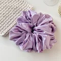 Oversized purple satin silk scrunchie with soft pleated texture for elegant ponytails - Purple