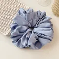 Oversized satin silk scrunchie in dusty blue color with soft glossy pleated texture - Blue