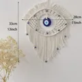 Handmade bohemian evil eye wall hanging decor with white cotton rope and blue beads - Style A Blue Eye Tapestry