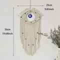 Handmade macrame evil eye wall hanging with bohemian cotton tassels and blue beads - Evil Eye Tapestry Style