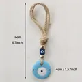 Blue Turkish evil eye hanging ornament with golden beads and jute rope for home decor - Sky Blue