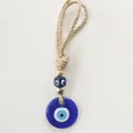 Blue Turkish evil eye wall hanging ornament with golden beads and natural jute rope - Dark Blue
