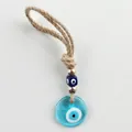 Blue Turkish evil eye hanging ornament with silver beads and woven hemp rope cord - Transparent Sky Blue