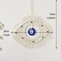 Handmade Macrame Evil Eye wall hanging in cream cotton rope with blue bead decor - Style B Blue Eye Tapestry