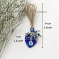 Decorazione da parete occhio blu a forma di cuore fatta a mano con corda di iuta 14cm - Decorazione Sospesa Malocchio a Cuore