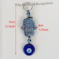 Blue Evil Eye Hamsa Hand keychain charm for bags or cars, size 13cm by 4cm - Geometric Eye Ornament Style 04