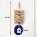 Handgefertigter Evil Eye Wandbehang mit blauem Glasanhänger und Boho-Quaste 23cm - Mehrfarbige Perlen Hanfseil Stil