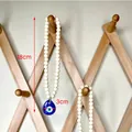 Decorazione boho in perline di legno con pendente occhio blu in vetro da 18 cm - Versione Piccola Perle in Legno