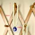 Decorazione da appendere con perline di legno e ciondolo occhio blu per auto e muro - Versione Grande Perle in Legno