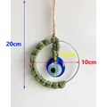 Decorazione da parete Evil Eye fatta a mano con trama in cotone verde e altezza 20cm - Verde Erba