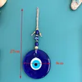 Türkischer Evil Eye Wandbehang mit goldenen Perlen und Kordel, Gesamthöhe von 27 cm - Goldperlen Blaues Auge / 8cm Durchmesser