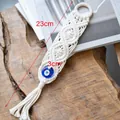 Handmade Bohemian Evil Eye wall hanging with blue glass bead and white cotton tassel macrame - Style A