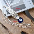 Handmade macrame evil eye pendant with blue glass charm and wooden beads, 16cm length - Style C