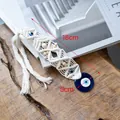 Handmade macrame evil eye wall hanging with wooden beads and blue glass pendant charm - Style D
