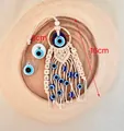 Handmade Macrame Evil Eye charm with blue beads and wood accents, length 16cm and width 5cm - IN LOVE Style