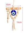 Handmade Evil Eye wall hanging with LOVE beads and white woven cotton tassels - Love Style