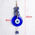 Blue Turkish evil eye wall hanging with 8cm glass pendant and beaded tassels - Classic Round