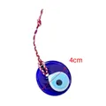 Ciondolo malocchio in vetro blu con cordoncino rosso bianco e diametro di 4 cm - Malocchio Blu Scuro Con Corda Rossa E Bianca (104)