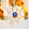 Decorazione da parete macramè bohémien con occhio di Allah e nappine in cotone - Bianco