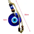 Detail eines 30cm Evil Eye Wandbehangs mit Holzperlen und 6cm blauem Glastalisman - Stil A (145)