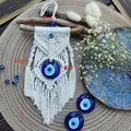 Handmade Evil Eye macrame wall hanging in cream cotton with blue glass bead charms - Style A