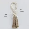 Coastal style white wooden bead hanging with starfish and natural jute tassels - White Beads Brown Thread
