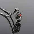 Close-up of vintage stainless steel Buddha pendant with red bead and box chain detail - Pendant Without Chain / Steel