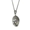 Detailed close-up of a vintage stainless steel Buddha head pendant with intricate textures - With Chain / Steel