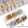 Macro view of six-grid box with gold and silver nail art aluminum foil flakes - Glitter Series (1909-04)