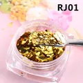 Vue macro de paillettes dorées hexagonales RJ01 pour nail art dans un pot transparent - Or (RJ01)