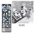 Halloween nail stamping plate SU-H01 with pumpkin, skull, and spider web patterns - Halloween Small Long Plate SU-H01
