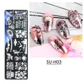 Halloween nail stamping plate SU-H03 with pumpkin and ghost patterns on pink nails - Halloween Small Long Plate SU-H03