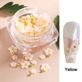 Resin sun flower nail charms in yellow color change effect with metal micro-beads - Yellow