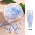 Blue resin flower nail art charms with silver beads in a jar for 3D manicure designs - Blue