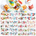 Detail view of 12 Christmas nail stickers featuring Santa, reindeer and snowflakes patterns - Cartoon Santa and Tree Style (BN997-1008)