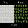 Glow-in-the-dark nail stickers with rose and butterfly patterns in day and night view - Butterfly & Rose (CY-032)