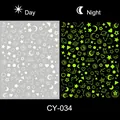 Luminous nail sticker CY-034 showing day and night glow effect with star and moon patterns - Celestial Stars (CY-034)
